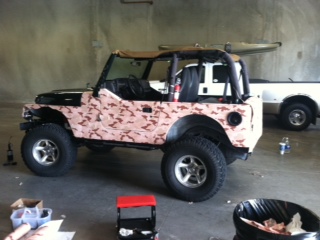 Jeep with driver side wrapped
