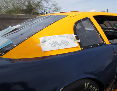 Adding vinyl decals to race car