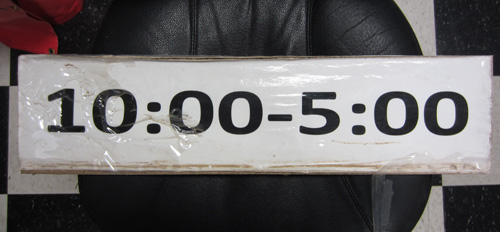 Old Sign with Hours