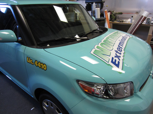 NW Exterminating Scion vehicle wrap