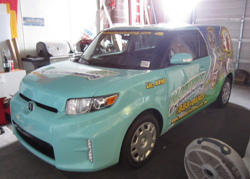 NW Exterminating Scion Vehicle Wrap