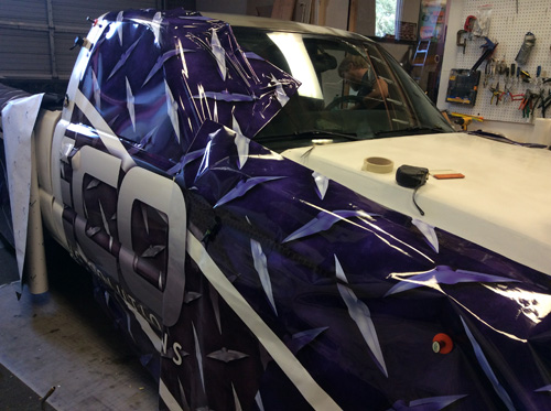 RECO Tucson Vehicle Wraps Progress